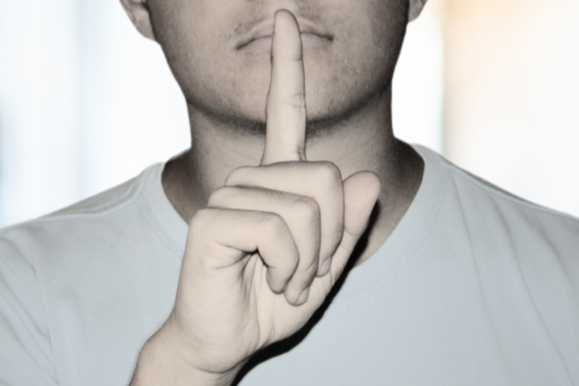 Schwarz-weiße Zeichnung mit Worten zum Thema Konflikt, darunter Stress und Sicherheit.
